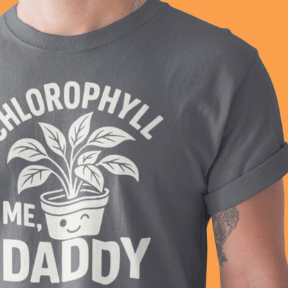 Gray t-shirt with a plant graphic and text on an orange background