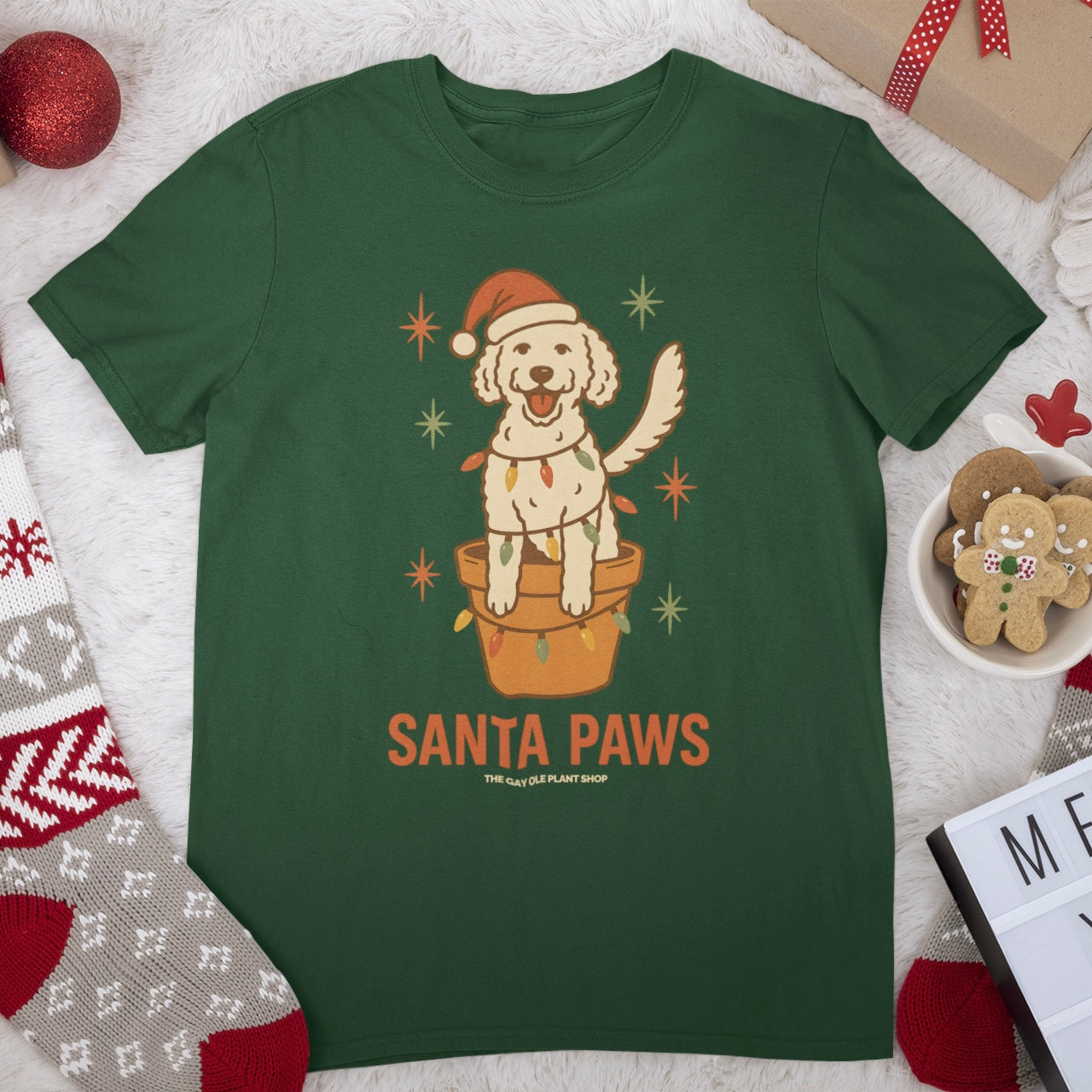 Green t-shirt with a dog wearing a Santa hat and &